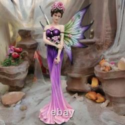 Enchanting Fairy Figurine Elegant Purple Flowers Mythical Statue Fantasy Decor