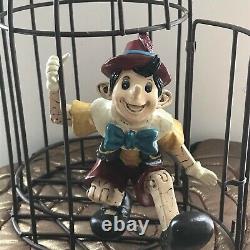 Pinocchio in Metal bird cage Resin Statue Figure