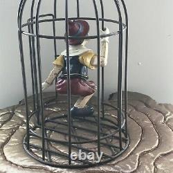 Pinocchio in Metal bird cage Resin Statue Figure