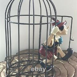 Pinocchio in Metal bird cage Resin Statue Figure