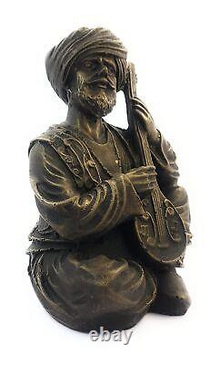 Resin Bronze Finished Traditional Men Playing Instrument Figure Statue Showpiece