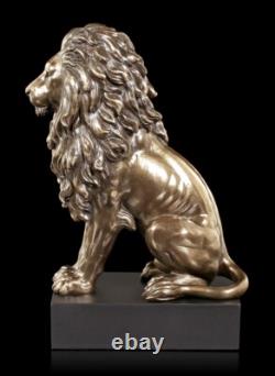 Sitting Lions Figure on Black Monolith Veronese Bronze-Look Statue