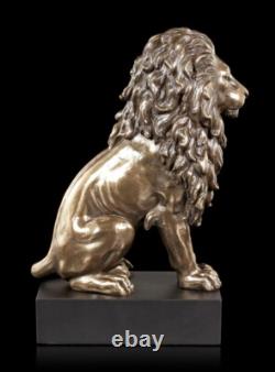 Sitting Lions Figure on Black Monolith Veronese Bronze-Look Statue
