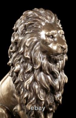 Sitting Lions Figure on Black Monolith Veronese Bronze-Look Statue